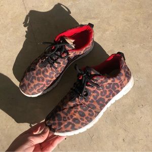 cheetah and red sneakers